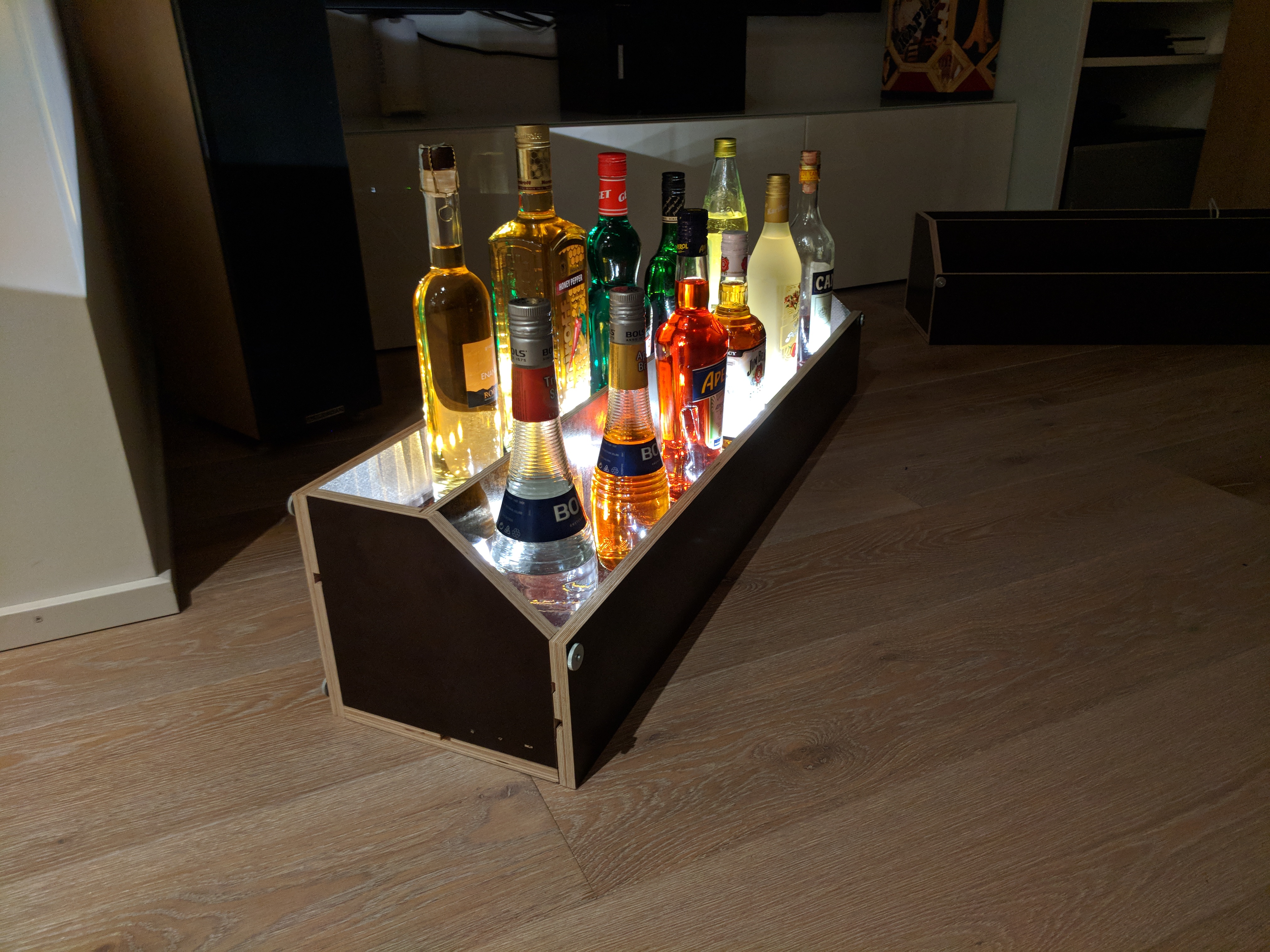 Assembled bar display with bottles